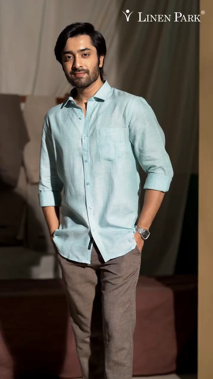 Linen Park campaign portrait in a pale blue shirt